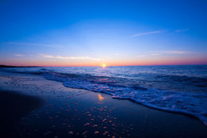 Sunset over sea. Blue nature fantasy marine landscape.